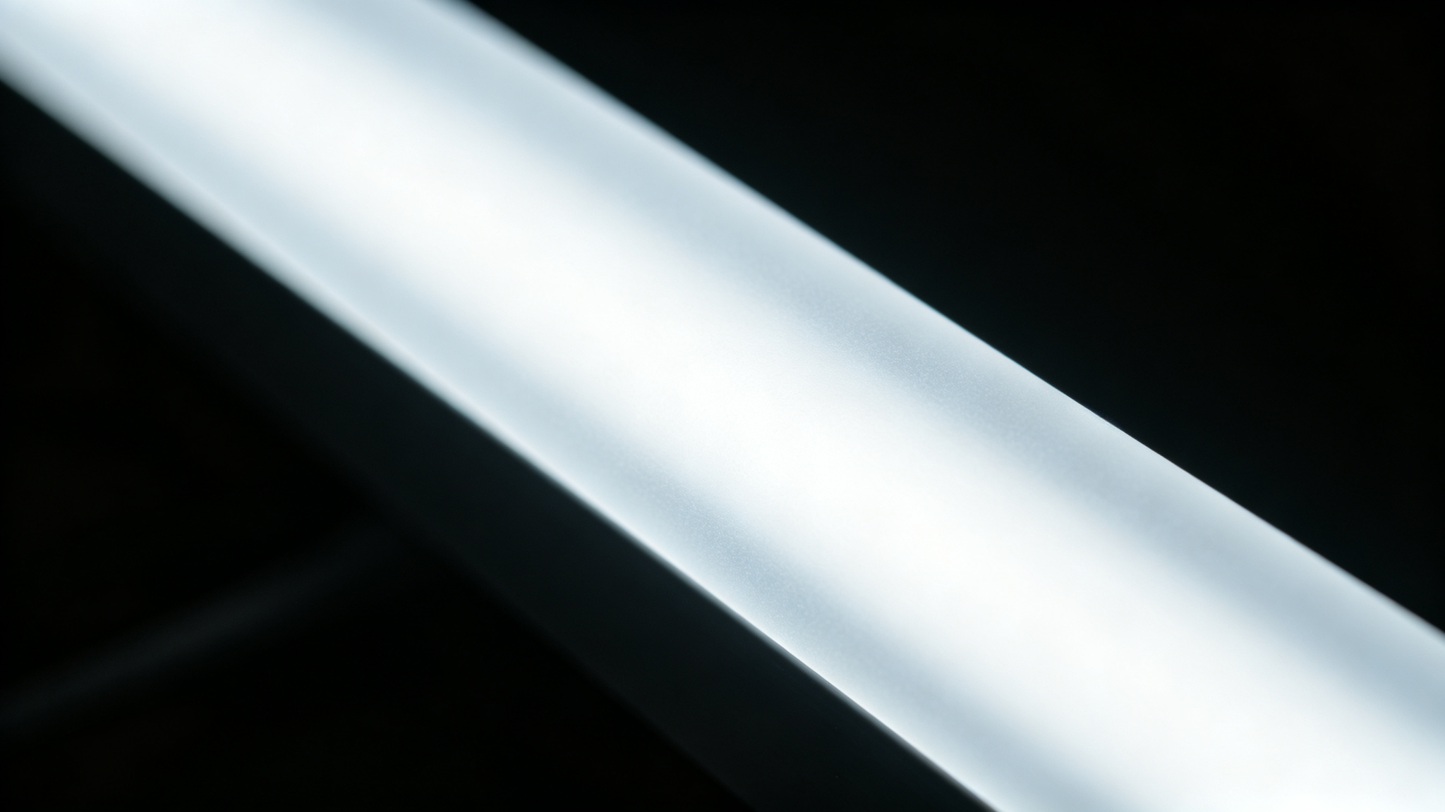 Macro of a frosted diffused silicone neon tube emitting a smooth uniform glow