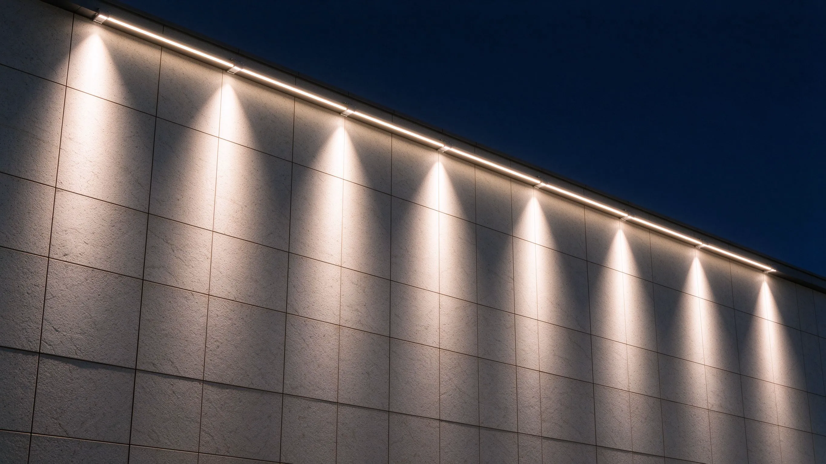 Wall-Washer Neon Tubes for Facades: Beam and Setback Distances